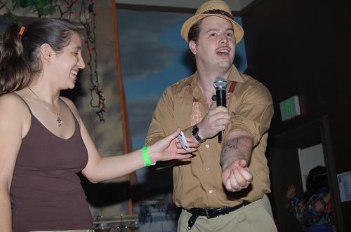 MCing for Three Ring Vixen fashion show. This is a card trick called The Tattooed Sailor.